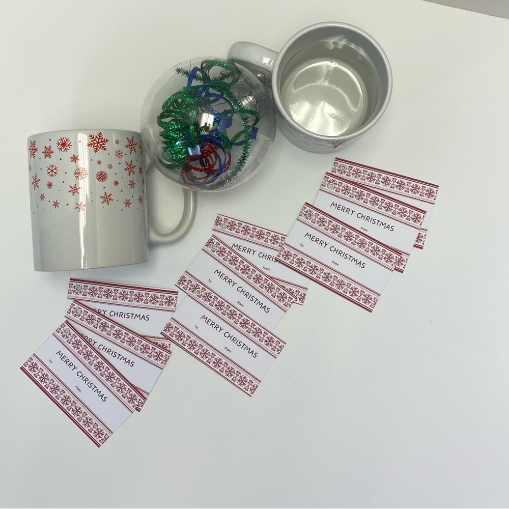 Bay island 2 set coffee mugs with 9 Christmas tags and one ornament